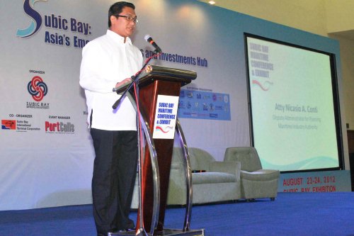 Lawyer Nicasio Conti, Deputy Administrator of Maritime Industry Authority delivers the message in behalf of President Benigno Aquino III during the Subic Bay Maritime Conference held recently at the Subic Bay Exhibition and Convention Center.