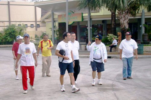 Members of the newly-formed â€œSubic Bay Six oâ€™clock Habit Club,â€ led by SBMA labor manager Severo Pastor (3rd from left), kick off an early morning walk at the Harbor Point promenade area in the Subic Bay Freeport.