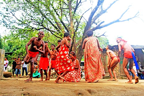 Members of the Pastolan Ayta indigenous tribe in the Subic Bay Freeport enact a tribal dance for the benefit of visitors.