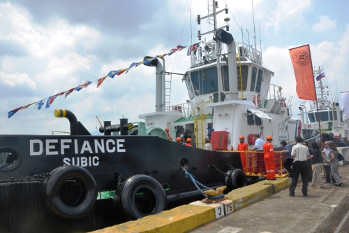 Guests board the M/T Defiance, one of the three new tugboats inaugurated by the Malayan Towage and Salvage Corporation at the Bravo Pier in the Subic Bay Freeport last Friday.