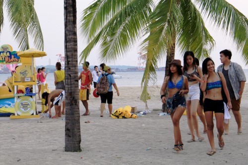 Visitors saunter along the waterfront during the Summer Siren beach festival, one of the recent tourism crowd-drawers at the Subic Bay Freeport