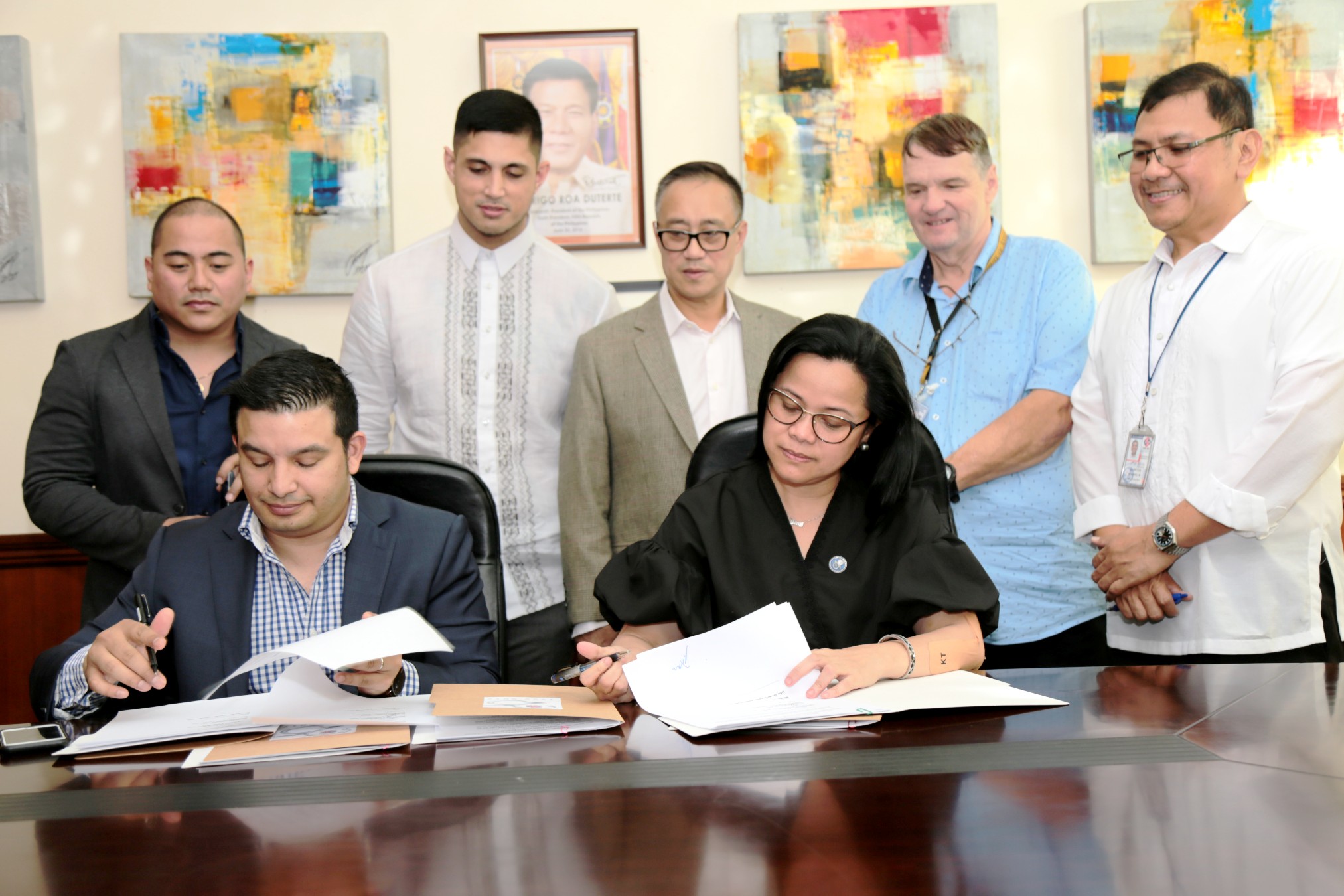 SBMA Chairman and Administrator Wilma T. Eisma and Mahanakorn Partners Group managing partner Luca Bernardinetti sign a memorandum of understanding for the conduct of feasibility studies of major infrastructure projects in the Subic Bay Freeport.