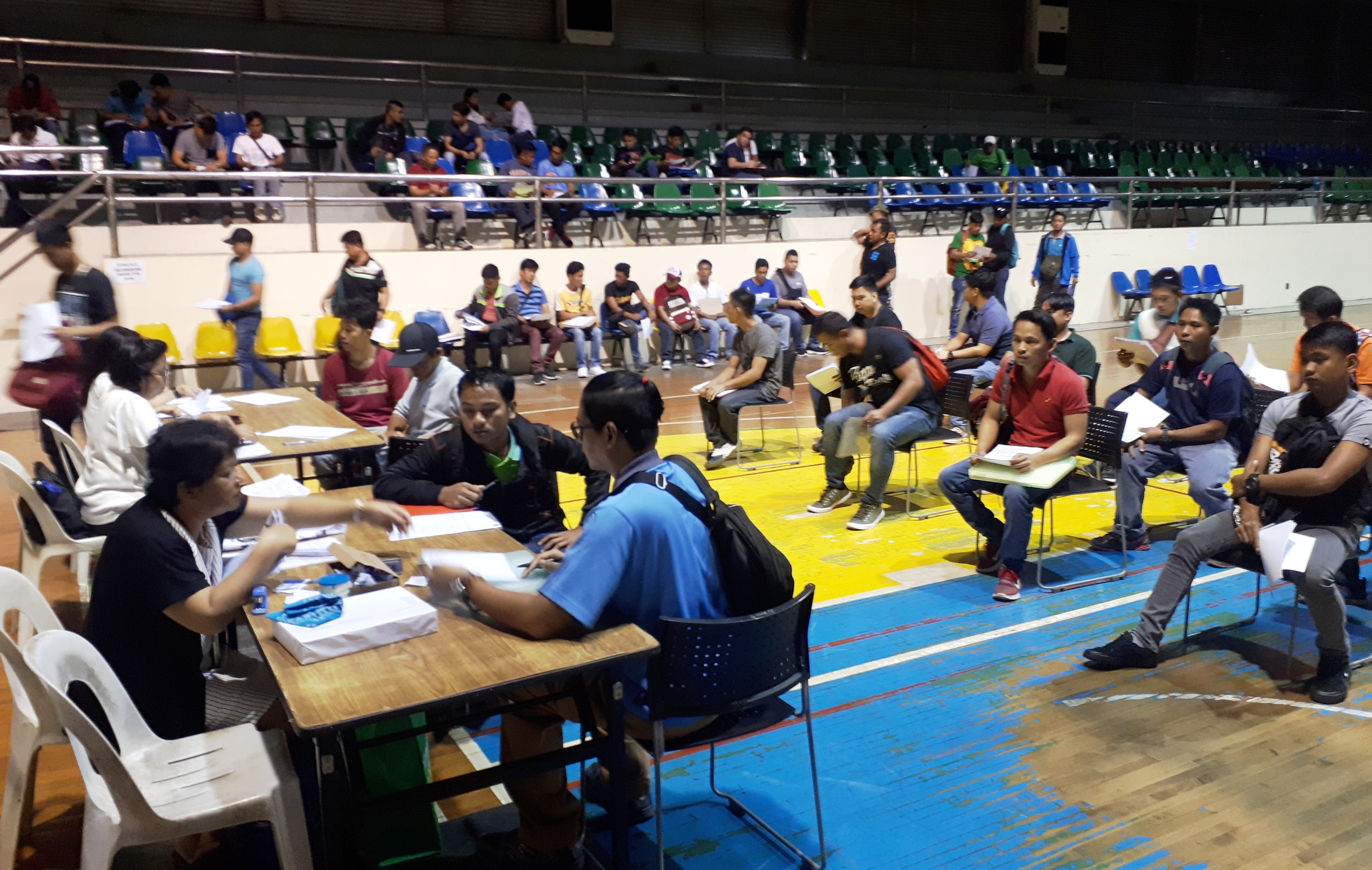 Former Hanjin workers pre-register with the SBMA Labor Department for a jobs fair on February 8 at the Subic Bay Freeport Zone.