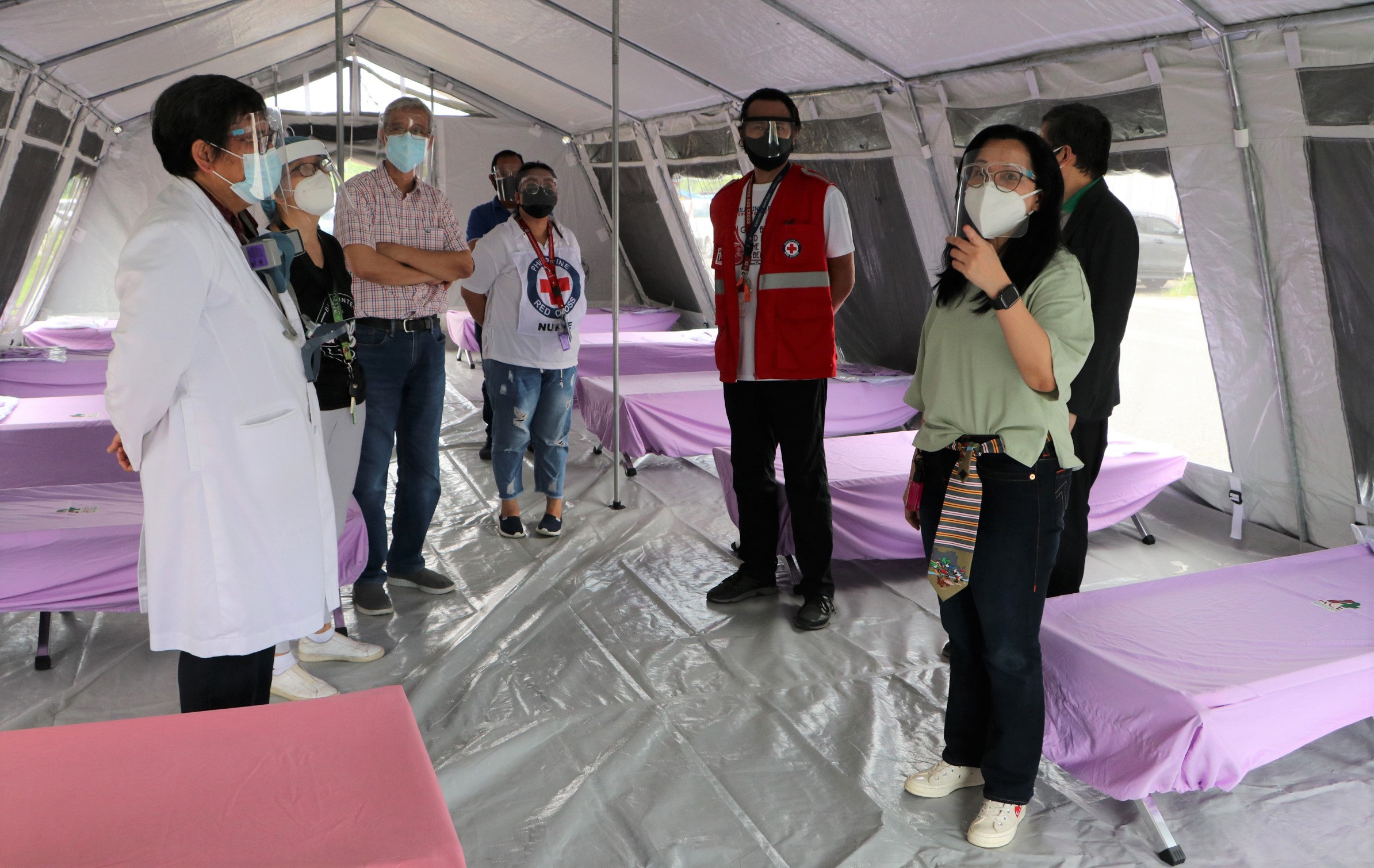 SBMA Chairman and Administrator Wilma T. Eisma inspects the Covid-19 medical tent, along with local infectious diseases expert Dr. Erlinda Alconga and other Baypointe Hospital officials