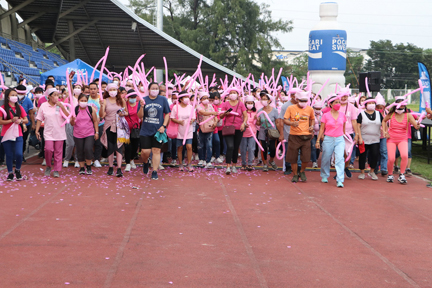Participants of the Pink Run 2022 sport their pink outfits as they make their way into the track of the Remy Field.