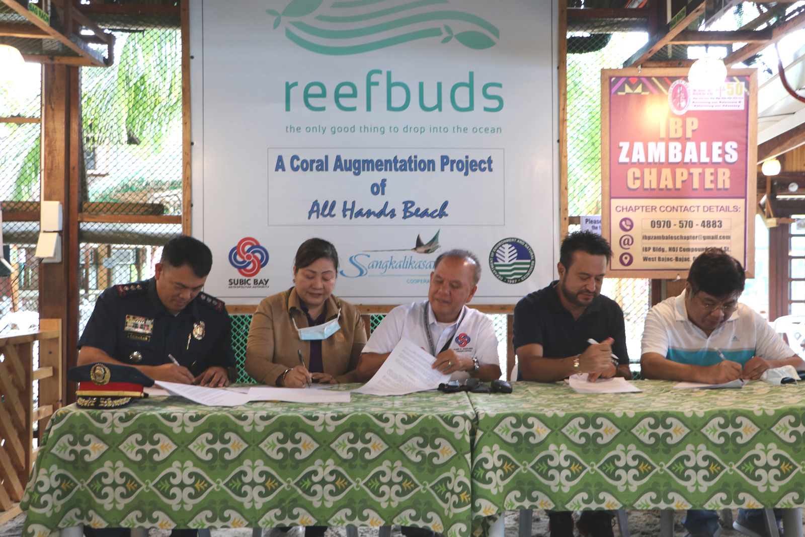 SBMA Chairman and Administrator Rolen C. Paulino (center), signs a Memorandum of Partnership Agreement with Marife L. Castillo, Provincial Environment and Natural Resources Officer of Zambales; Mark S. Dayrit (second from right), Chairman of Brighterday Subic Ltd. Inc., operator of All Hands Beach Resort; Jose Rodriguez of Sangkalikasan, a non-government organization and P/Col. Fernando Cunanan Jr. of the PNP Regional Maritime Unit for a collaborative partnership among various agencies, LGUs and NGOs in establishing and protection of marine turtle nesting areas and rehabilitation of coral reefs of Subic Bay.