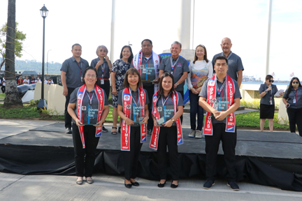 Other contenders for the Category 2 were (front, L-R) Lolita Bondoc of the Chairman and, Sheryll Rose Santiago of the Business and Investments Group, Engr. Janet Pasoot of the Public Services Group, Jess Cipriano of the Operations Group, and (not in picture) Genie Rose Vicente of the Support Services Group.