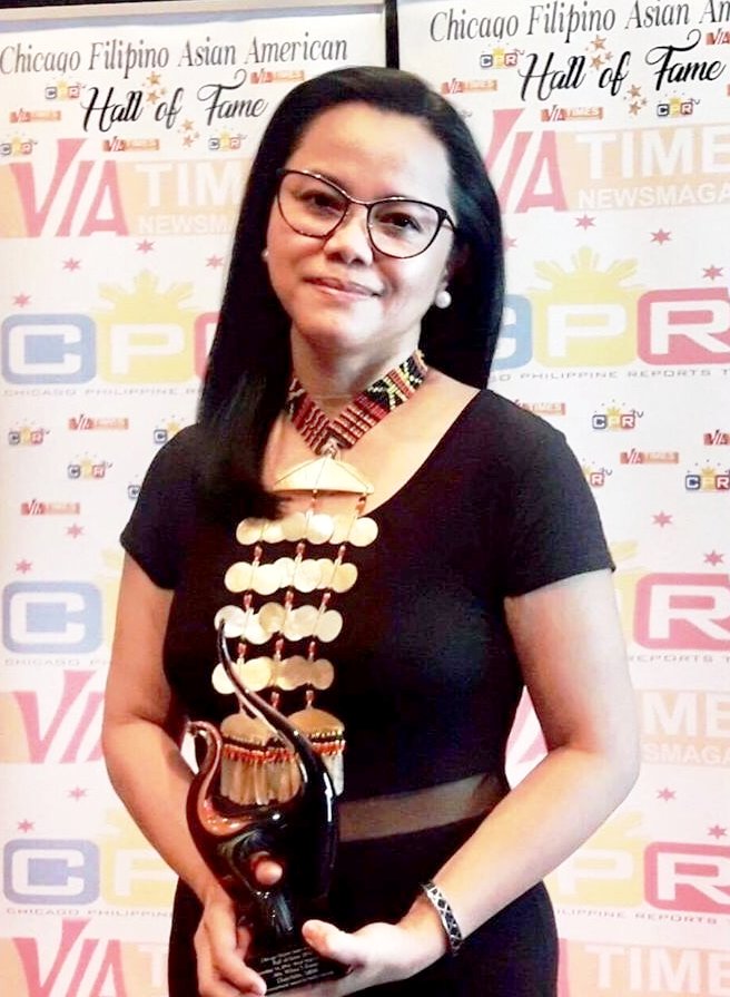 SBMA Chairman and Administrator Wilma T. Eisma with the Award in International Public Service she received in Chicago in 2018.