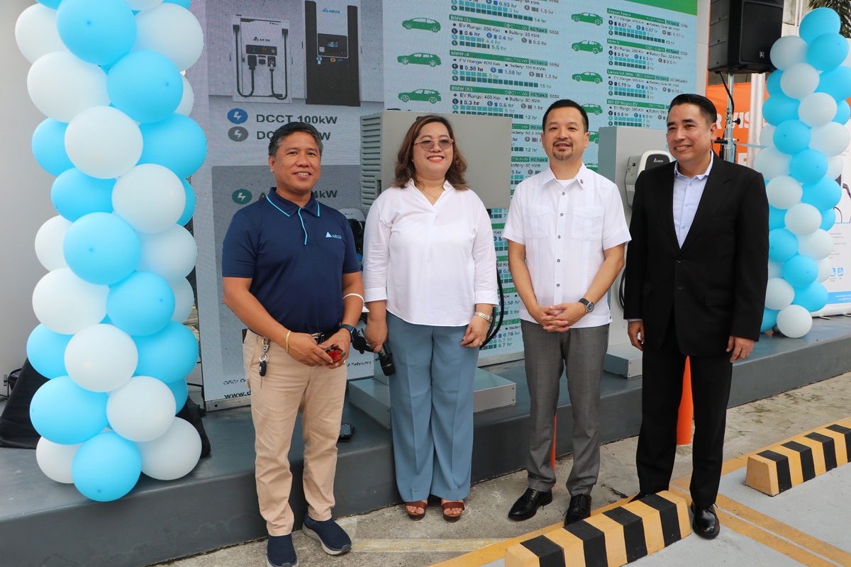 Subic Bay Metropolitan Authority (SBMA) Chairman and Administrator Jonathan D. Tan (in white polo) joins product presenters and proponents of the Electric Vehicle Charging Station (EVCS) at the Uni-Oil gasoline station in Subic Bay Freeport Thursday, June 15.
