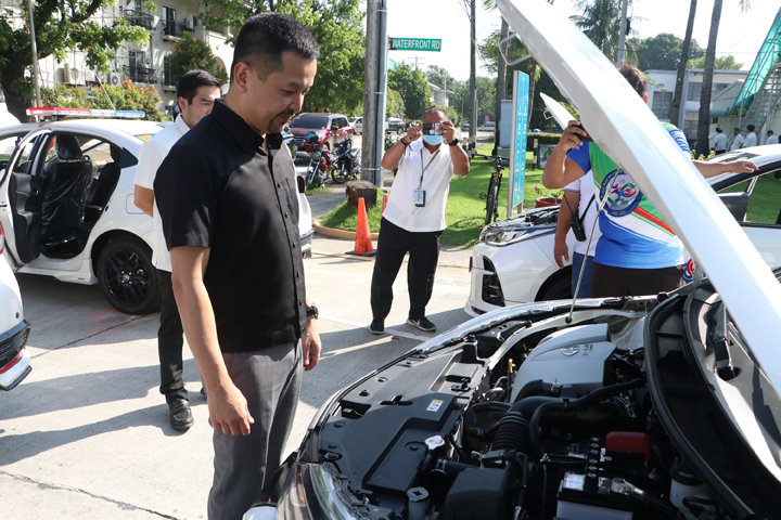 SBMA Chairman and Administrator Jonathan D. Tan walks through the fleet of newly purchased service vehicles during its blessing at the Waterfront Road on Monday. The purchase of these new service vehicles is part of the agency’s modernization to serve its stakeholders better.