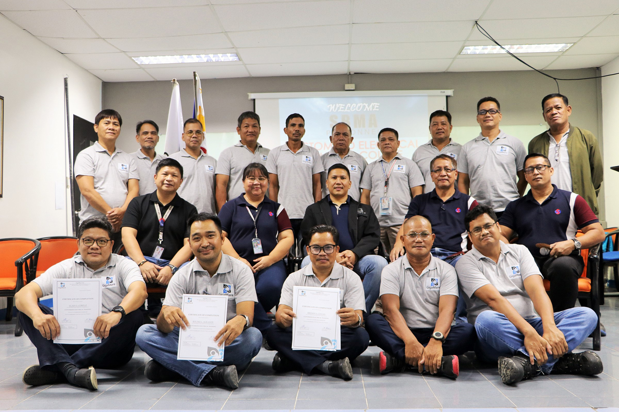 15 SBMA personnel who participated in the recently concluded Customized Electrical Training Course with Human Resource Management Department staff huddle up for a group photo during a simple ceremony held at Gigamare Inc.Training Facility at the NavMag area in Subic Bay Freeport zone.