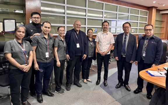 Subic Bay Metropolitan Authority (SBMA) Chairman and Administrator Jonathan D. Tan and Planning and Development Office manager Vicente Evidente, Jr. and staff pose for a souvenir photo with team leader Marlo Aquino of the international audit team DQS.