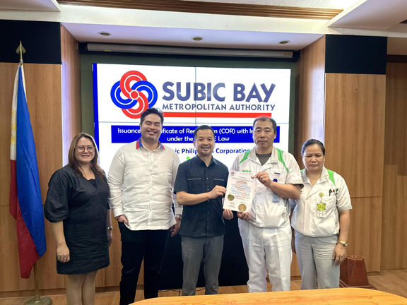 SBMA Chairman and Administrator Jonathan D. Tan awards the Certificate of Registration (COR) with Incentives under the CREATE law to Nidec Subic Philippines Corporation President Takeshi Yamamoto during a simple ceremony held at the boardroom of the administration building on Tuesday. Nidec Subic Philippines was granted incentives under the CREATE law which include a tax holiday, special corporate income tax, duty exemption, VAT exemption on importation, and VAT zero rate on local purchases. Nidec Subic Philippines is the lead development, manufacturing, and sales of small precision motors, automotive motors, home appliance motors, commercial and industrial motors, motors for machinery, electronic and optical components, and other related products.