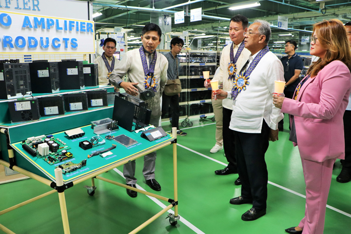 Subic Bay Metropolitan Authority (SBMA) Chairman and Administrator Eduardo Jose L. Aliño and Sanyo Denki President Hirokazu Takeuchi check on some of the products on display as they tour the new building of Sanyo Denki Philippines, Inc. at the at Subic Techno Park inside the Subic Bay Freeport zone on March 22, 2024. Also joining them is Ms. Karen Magno, head of the SBMA Business and Investment Department for Manufacturing and Maritime.