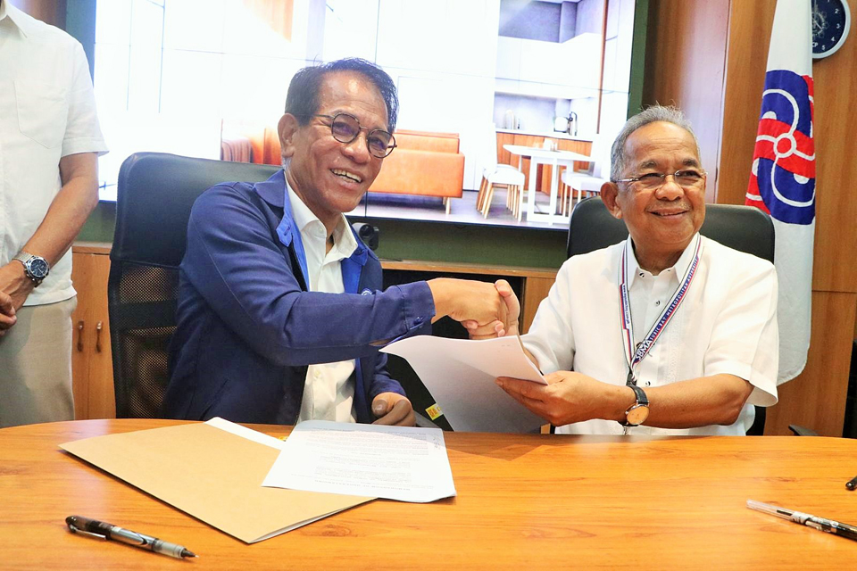 Subic Bay Metropolitan Authority (SBMA) Chairman and Administrator Eduardo Jose L. Aliño and Department of Human Settlements and Urban Development (DHSUD) Secretary Jose Rizalino Acuzar seal the deal with a handshake after signing yesterday the Memorandum of Understanding (MOU) for the establishment of employee housing in the Subic Bay Freeport Zone.