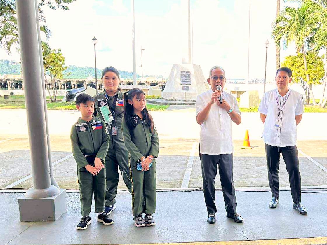 Subic Bay Metropolitan Authority (SBMA) Chairman and Administrator Eduardo Jose L. Aliño congratulates Special Education for the Gifted (SPED-G) Kalayaan grade VI students Anne Margarette Inton, Dru Triguero, and Zyrene Tantay of the Aerosense Team for bagging 3 rd  place in the 23rd Philippine Robotics Olympiad’s Future Innovators Category-Elementary Level.