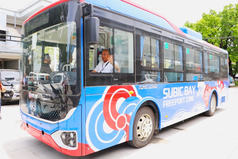 Subic Bay Metropolitan Authority (SBMA) Chairman and Administrator Eduardo Jose L. Aliño gets a feel for how comfortable the new e-buses are.