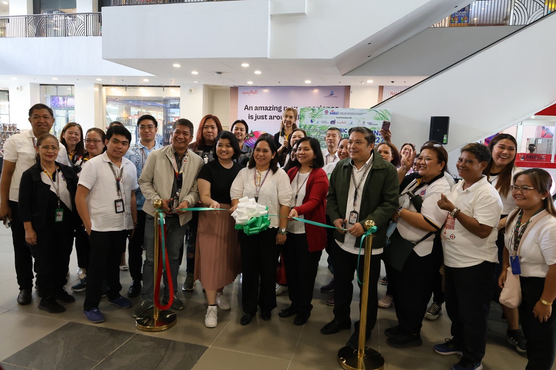 Subic Bay Metropolitan Authority (SBMA) Chief-of-Staff, Atty. Von Rodriguez (2nd  right from center), joins Department of Trade and Industry (DTI)-Zambales Provincial Director Enrique Tacbad (2nd left from center) and SBMA Ecology Center Officer-in-Charge Rossell L. Abuyo (center) in cutting the ceremonial ribbon that kicked off a week-long celebration of the Subic Bay Arbor Day held Monday, June 23 at the Ayala Malls Harbor Point Promenade in Subic Bay Freeport.