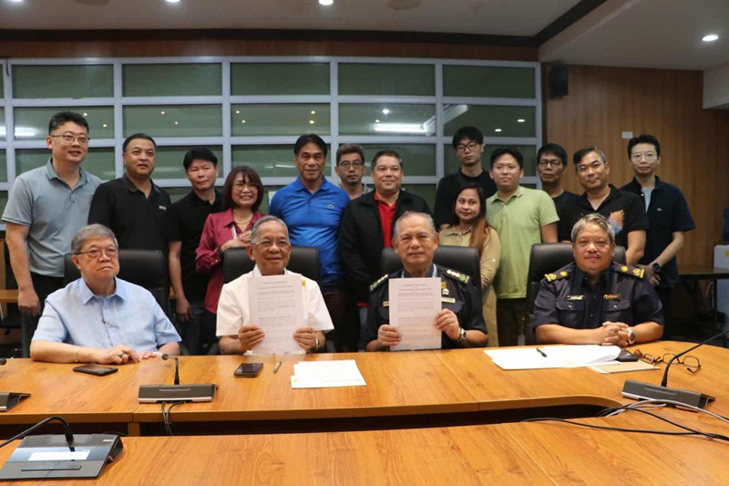Subic Bay Metropolitan Authority (SBMA) Chairman and Administrator Eduardo Jose L. Aliño and Bureau of Customs (BOC)-Port of Subic District Collector Noel C. Estanislao present the signed Memorandum of Understanding (MOU), which will regulate the admission of recyclable non-hazardous materials and boost the recycling sector, at the Corporate Boardroom of the Administration Building here on October 2, 2025.