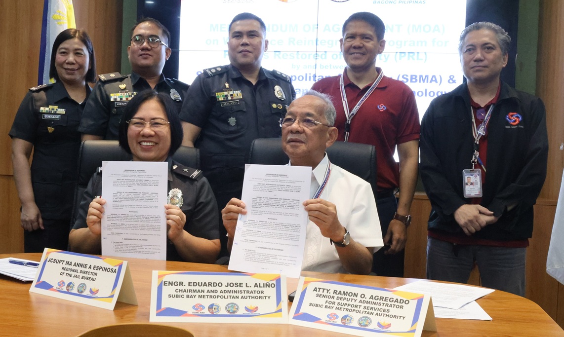 SBMA Chairman and Administrator Eduardo Jose L. Ali&ntilde;o (seated, right) and Bureau of Jail Management and Penology (BJMP) Regional Director JCSupt Ma. Annie A. Espinosa (seated, left) show the signed Memorandum of Agreement (MOA) for the&nbsp;Workplace&nbsp;Reintegration Program intended for Persons Restored of Liberties (PRLs) held at the SBMA Boardroom on Thursday, June 4.&nbsp; Also in the photo are (L to R) Olongapo District Jail Female Dormitory Warden JCInsp Carolina L. Coralde; Olongapo District Jail Male Dormitory Warden JCInsp Derrel G. Grezula; Provincial Jail Administrator BJMPPO-Zambales JSupt Ferdinand G. Malabo; SBMA Senior Deputy Administrator for Support Services Atty. Ramon O. Agregado and SBMA Labor Department Manager Atty. Melvin L. Varias.