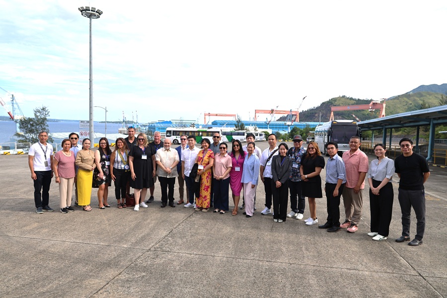 Subic Bay Metropolitan Authority (SBMA) staff from various departments assisting the US Trade Mission delegates join the latter for a photo opportunity during a visit to Agila Subic Compass, Inc. on Wednesday, July 8.